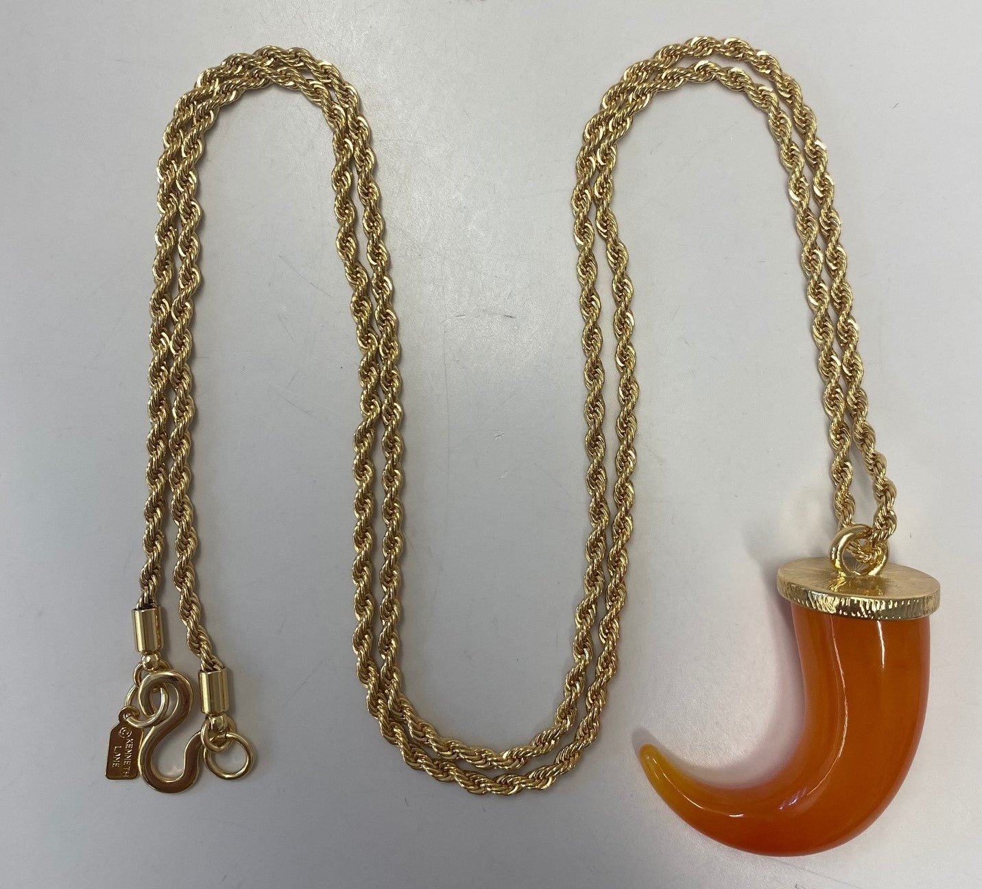 34" Small Amber Tooth on Gold Chain