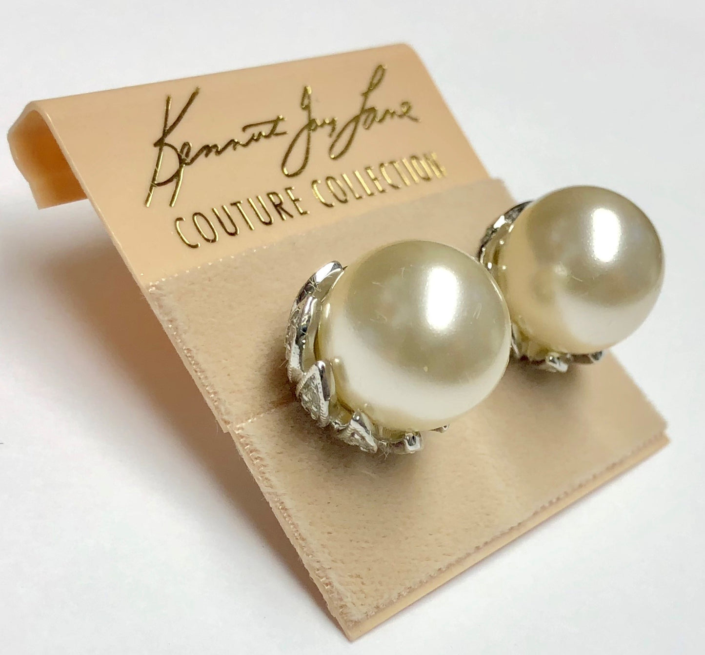 Rhodium Crystals And White Pearl Center Flower Bud Clip Earring