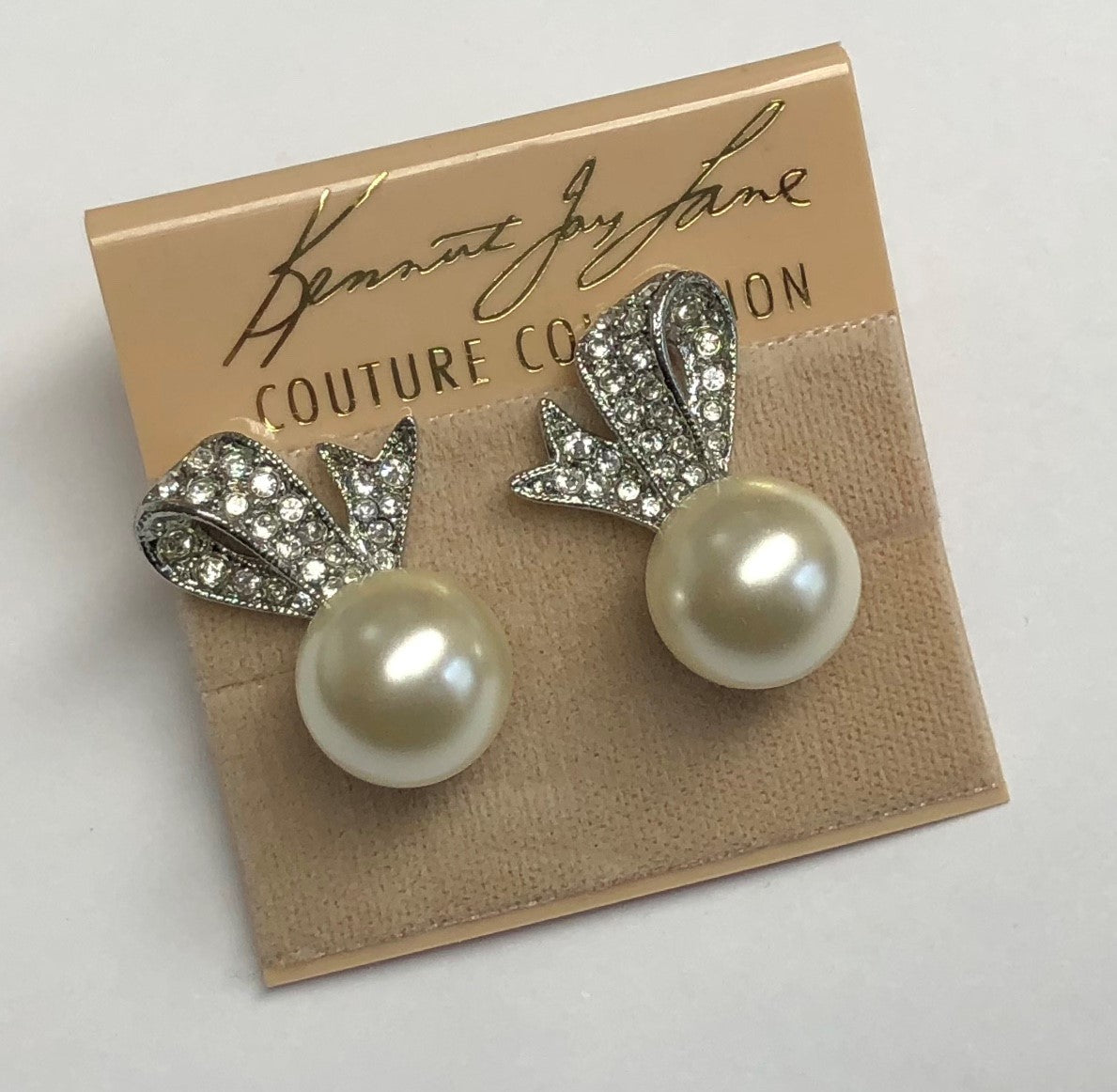 Rhodium Crystal Bow Top With White Pearl Bottom Clip Earring