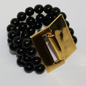 4 Row Black Bead With Polished Gold Clasp Bracelet