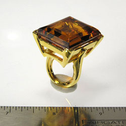 Polished Gold and Large Topaz Center Ring