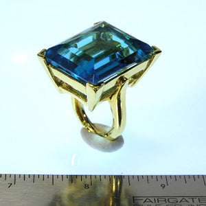 Polished Gold and Large Aqua Center Ring