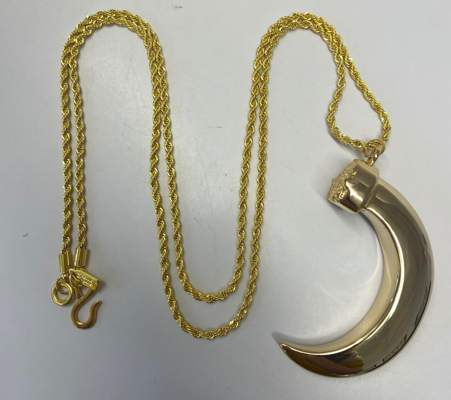 34" Polished Gold Tooth Pendant On Gold Chain Necklace