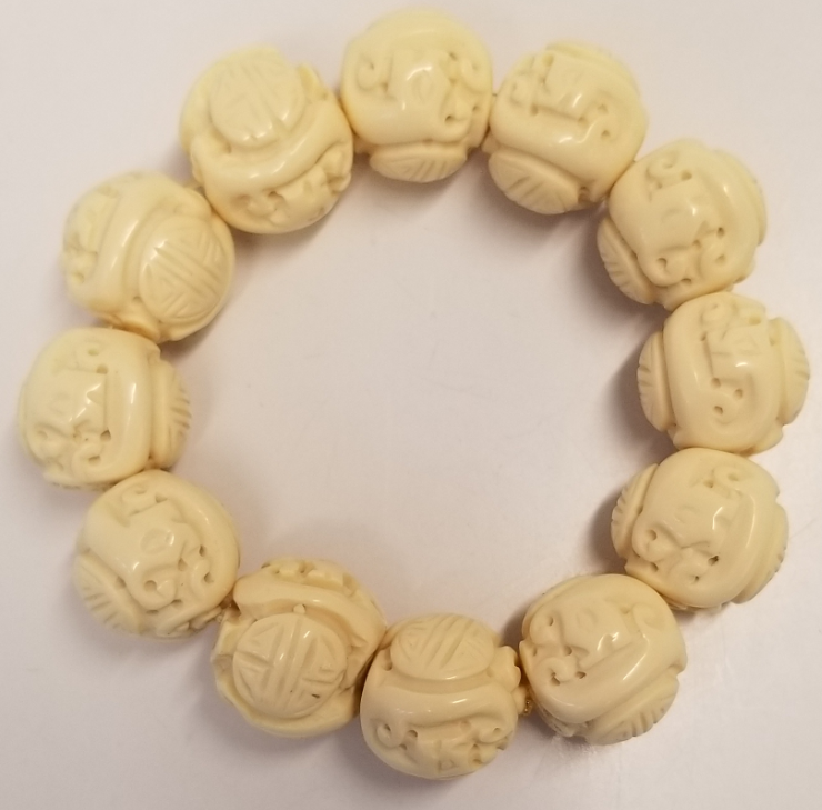 Ivory Carved Ball Stretch Bracelet